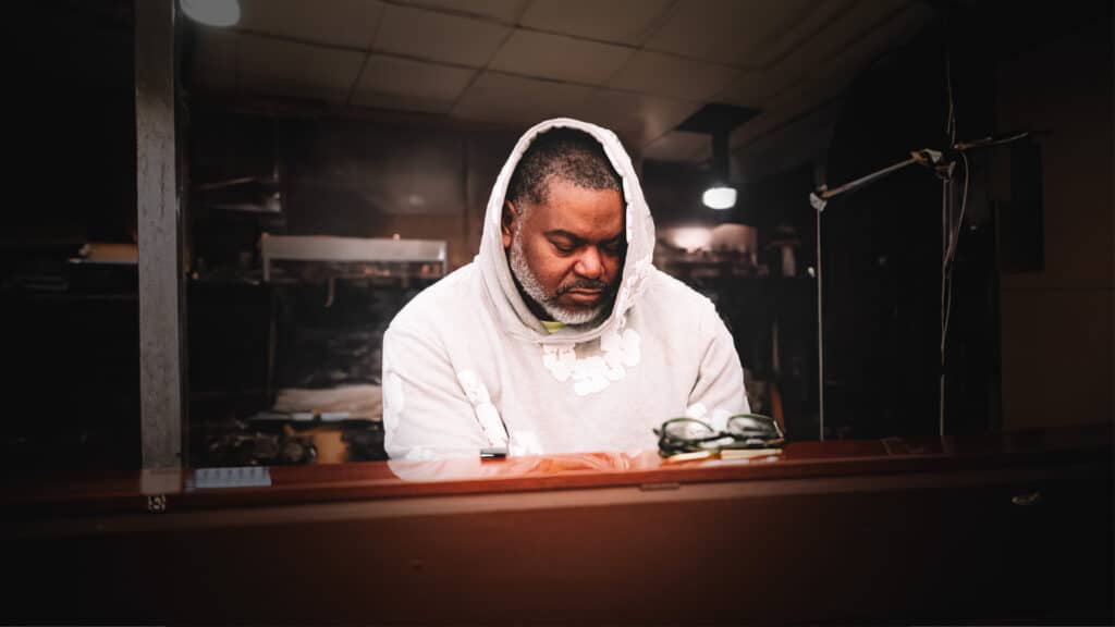 Che Pope in a studio